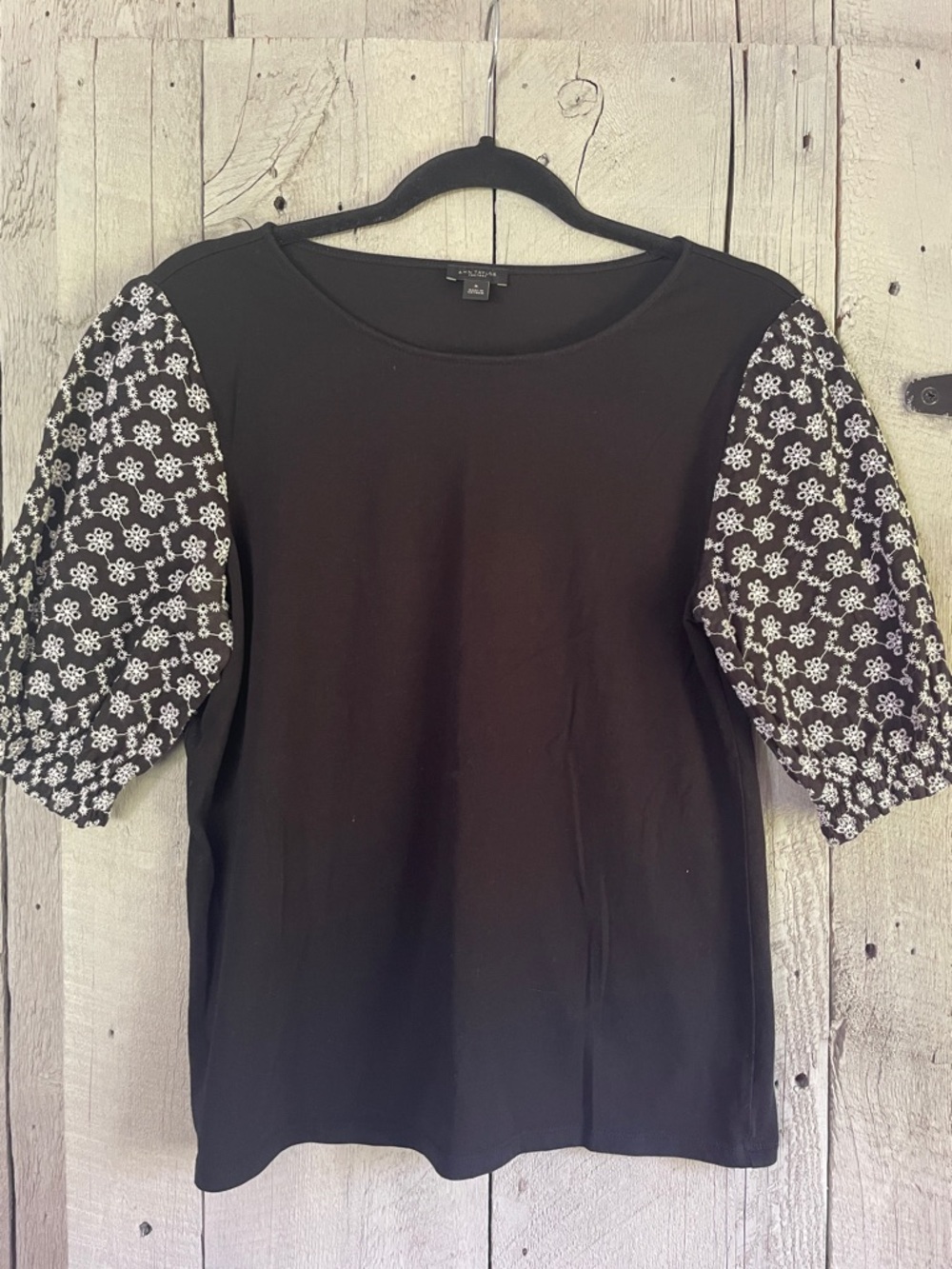 Ann Taylor Factory Black Top with White Floral Puff Sleeves